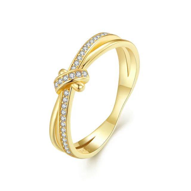 Elegant European & American Style S925 Sterling Silver Knot Ring with Micro-paved Zircon - Simple, High-end Fashion for Women.