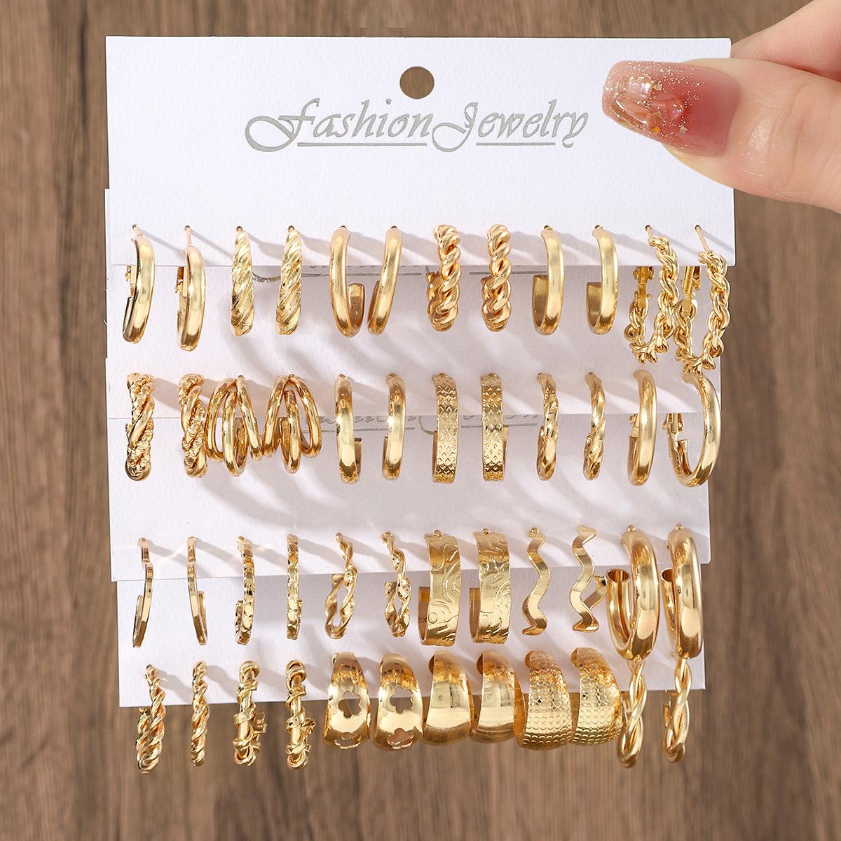 

Hot-selling foreign trade sources, European and American style gold C-chain earrings set, women s temperament light luxury ear jewelry