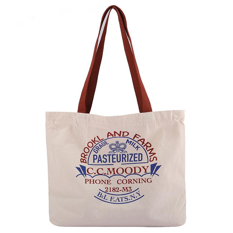 Canvasväska dam campus student axelväska ins vind stor kapacitet bokstav tygkasse