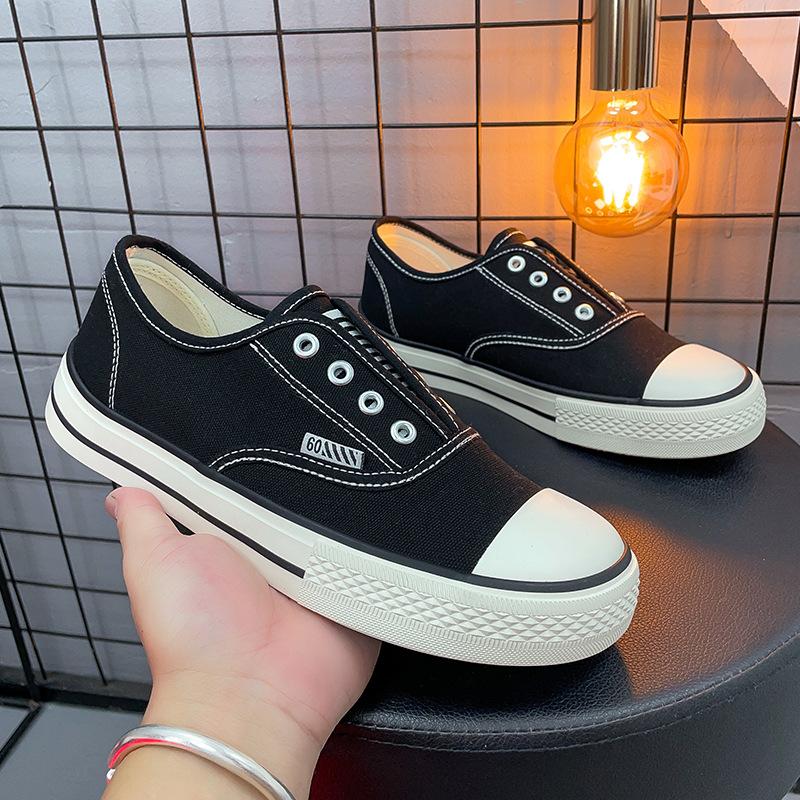 

Canvas shoes men s spring new men s board shoes casual sports canvas shoes Hong Kong style students casual one-pedal cloth shoes 44 чорний
