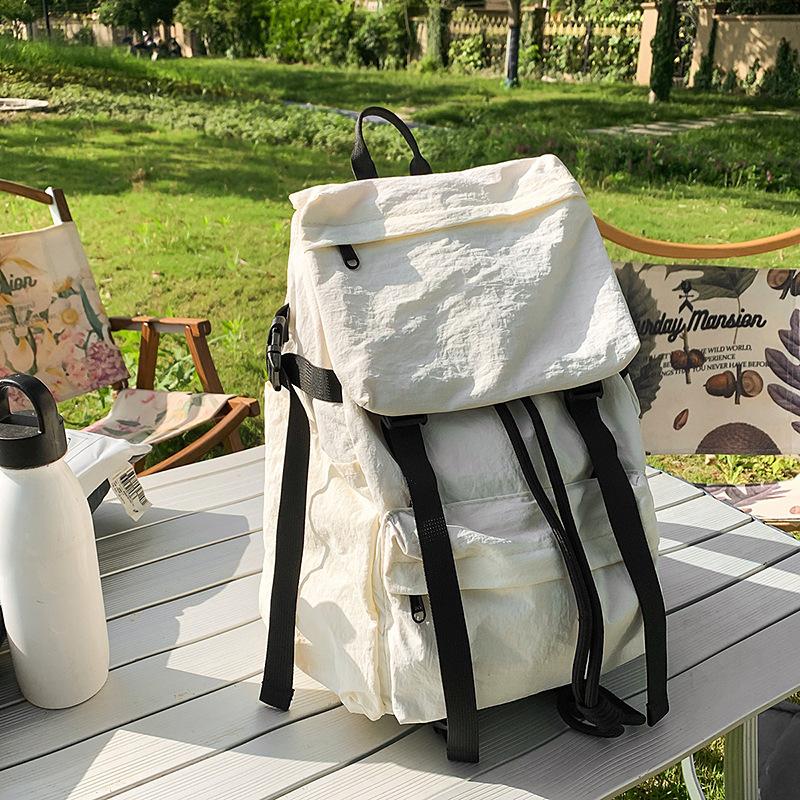Japanese ins style school bag female college student outdoor mountaineering trip backpack light and versatile boy high school student backpack