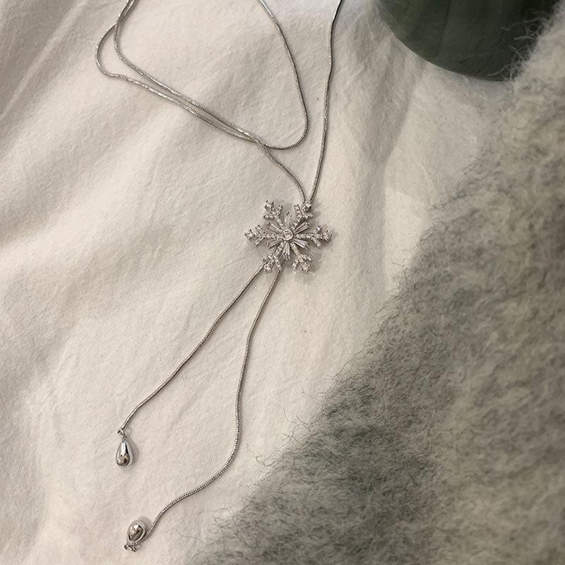 

Выдвижное длинное ожерелье в виде снежинки из циркония для женщин, легкое, роскошное, высокого класса, элегантное, модное, темпераментное, универсальное, цепочка на шею, цепочка на свитер