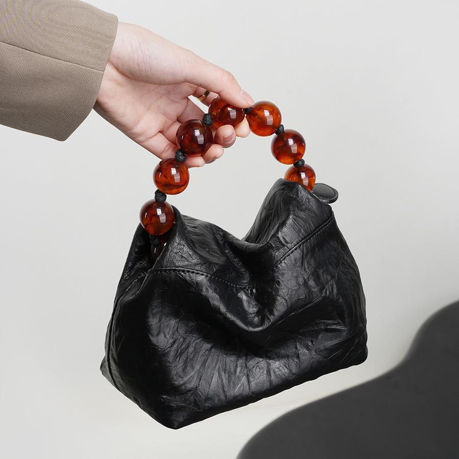 Kopfschichtige Damentasche aus echtem Leder mit Perlen-Tragetasche, neue Perlentasche im chinesischen Stil, Lunchbox-Tasche mit speziellem Handgriffmuster