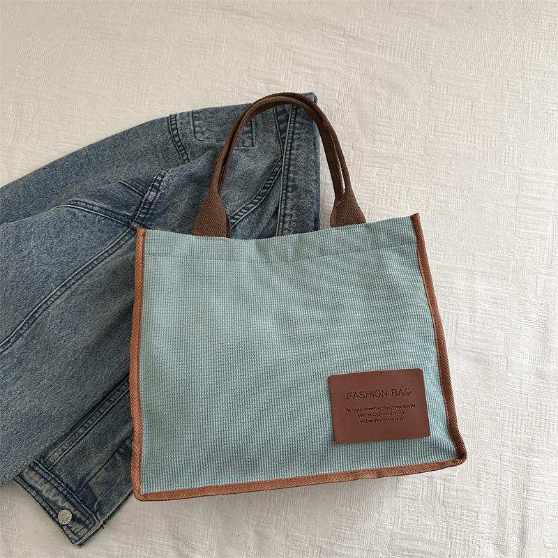 2025 summer new literary and artistic large-capacity class shoulder portable messenger bag casual simple canvas women's bag