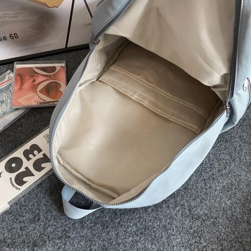 New simple schoolbag women's large-capacity anti-splashing middle school student backpack high-value girl backpack