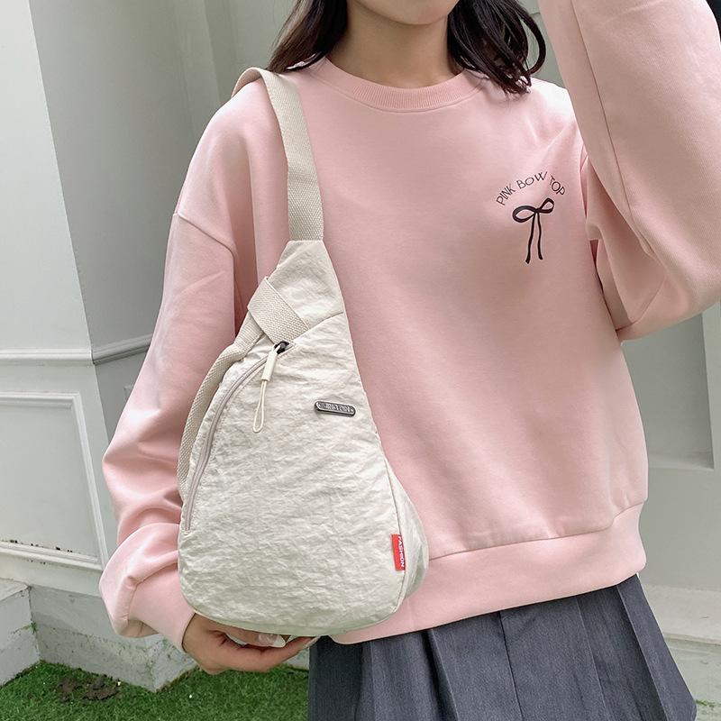 New Japanese simple breast bag couple shoulder messenger bag men's bag large capacity storage bag women