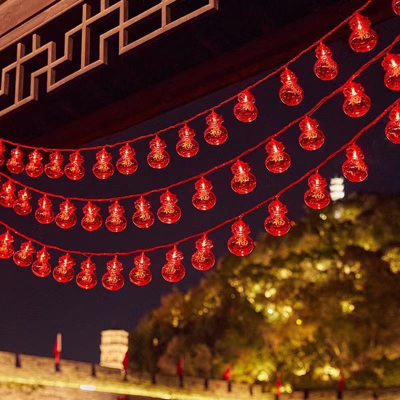 Solar-Powered New Year Lantern String Lights with Fu Character and Lucky Bag Design