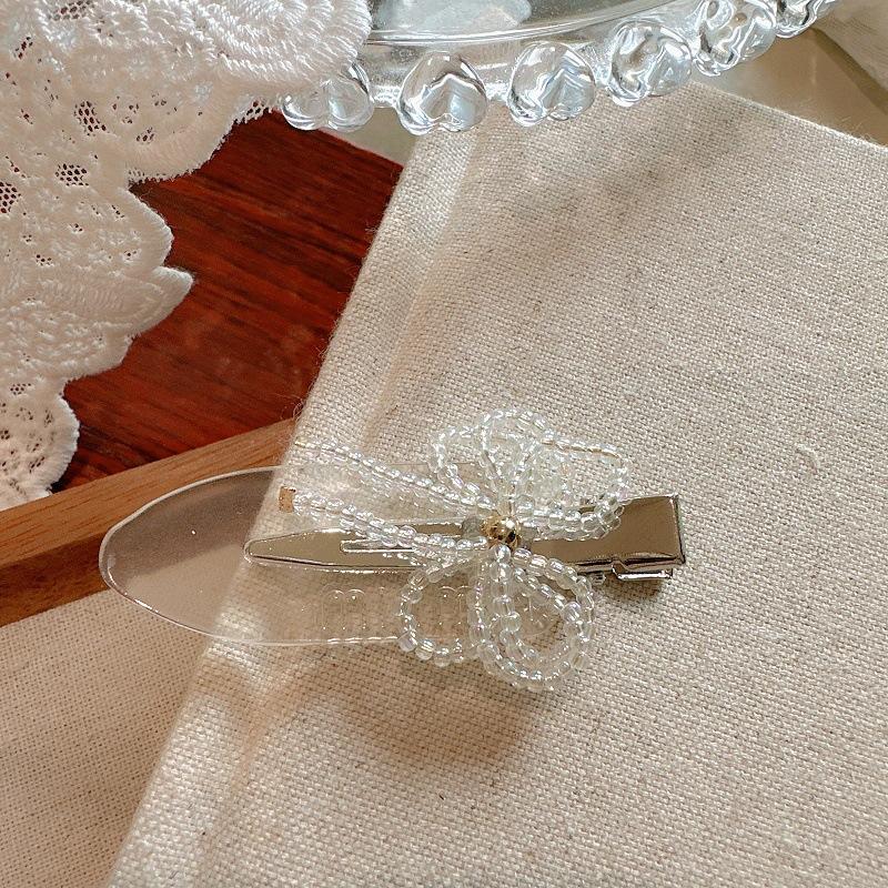 

Акриловые рисовые бусины цветок боковая заколка модный и изысканный дизайн зажим-уточка универсальные аксессуары для волос бижутерия женская с высоким чувством