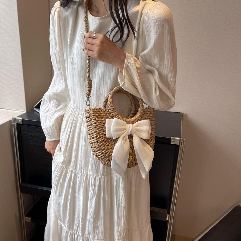 

Летняя новая нишевая универсальная пляжная соломенная сумка, портативная, через плечо, сумка-корзина для овощей, женская сумка