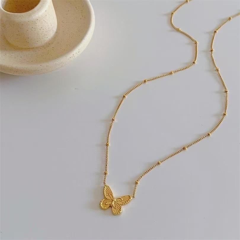 Golden butterfly element necklace female niche high-end sense fashion simple versatile bead collarbone chain for girlfriend jewelry