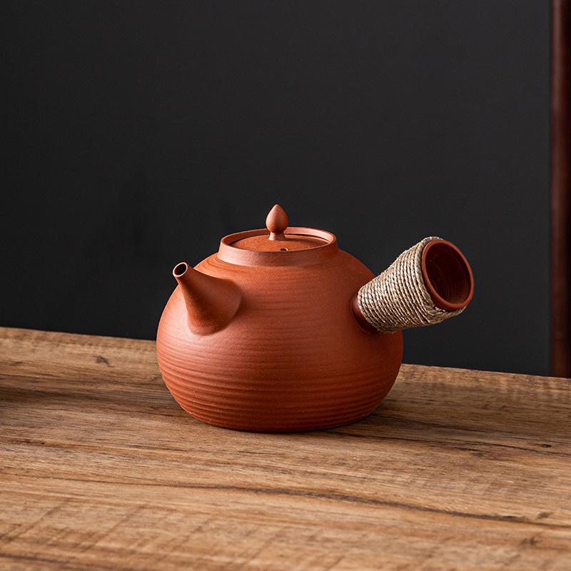 Ceramic Kung Fu Tea Set: Black Teapot with Side Handle and Charcoal Stove for Open Fire.