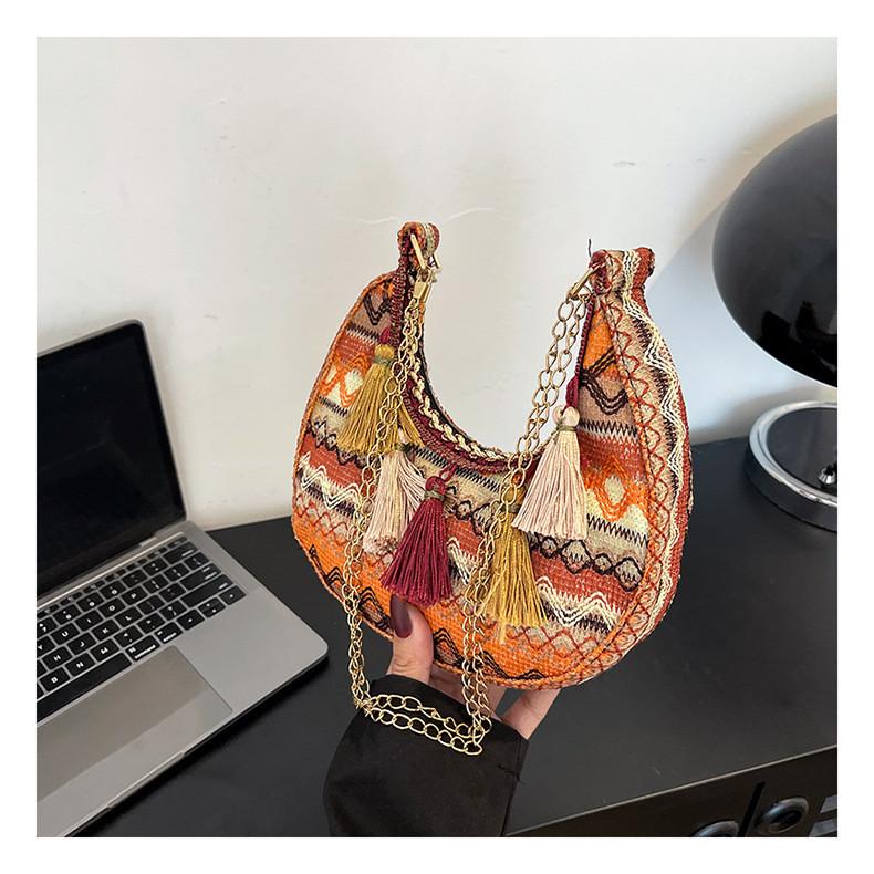 Trendy Crescent Satchel With Tassels And Chain For Streetwear Fashion