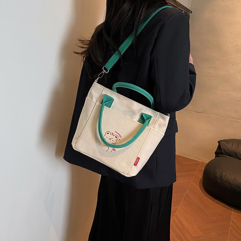Korean Contrasting Color Portable Canvas Bag Women's 2025 New Casual Messenger Bag Popular Literature Cute Commuter Bag