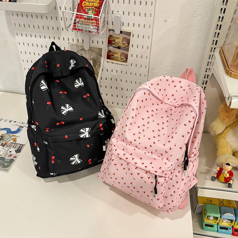 Korean small fresh schoolbag female college student simple small floral backpack lightweight large capacity high school backpack