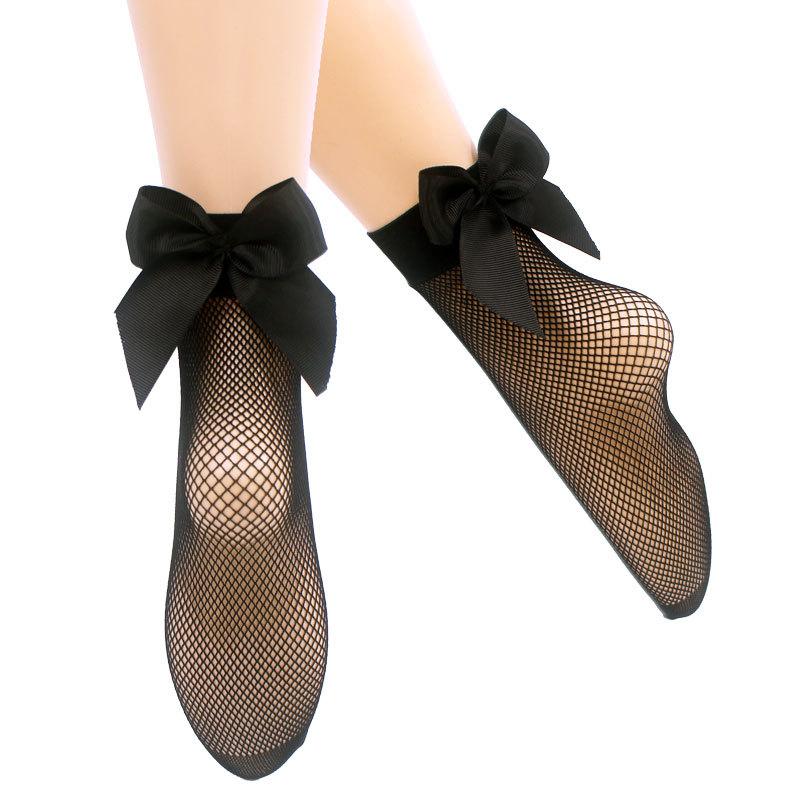 

Trendy fishnet socks with bowknot and hollow design, black, breathable, with dense small, medium, and large mesh for women Average Size