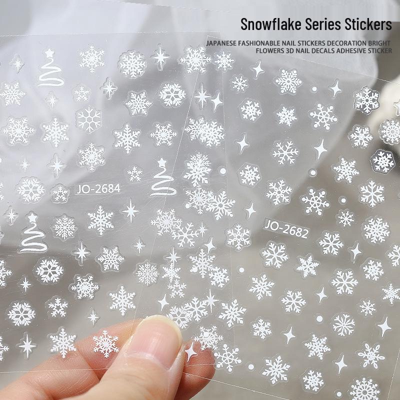 Winter-Schneeflocken-Nagelaufkleber: Festliche weiße Hohlmuster für saisonale Nagelkunst