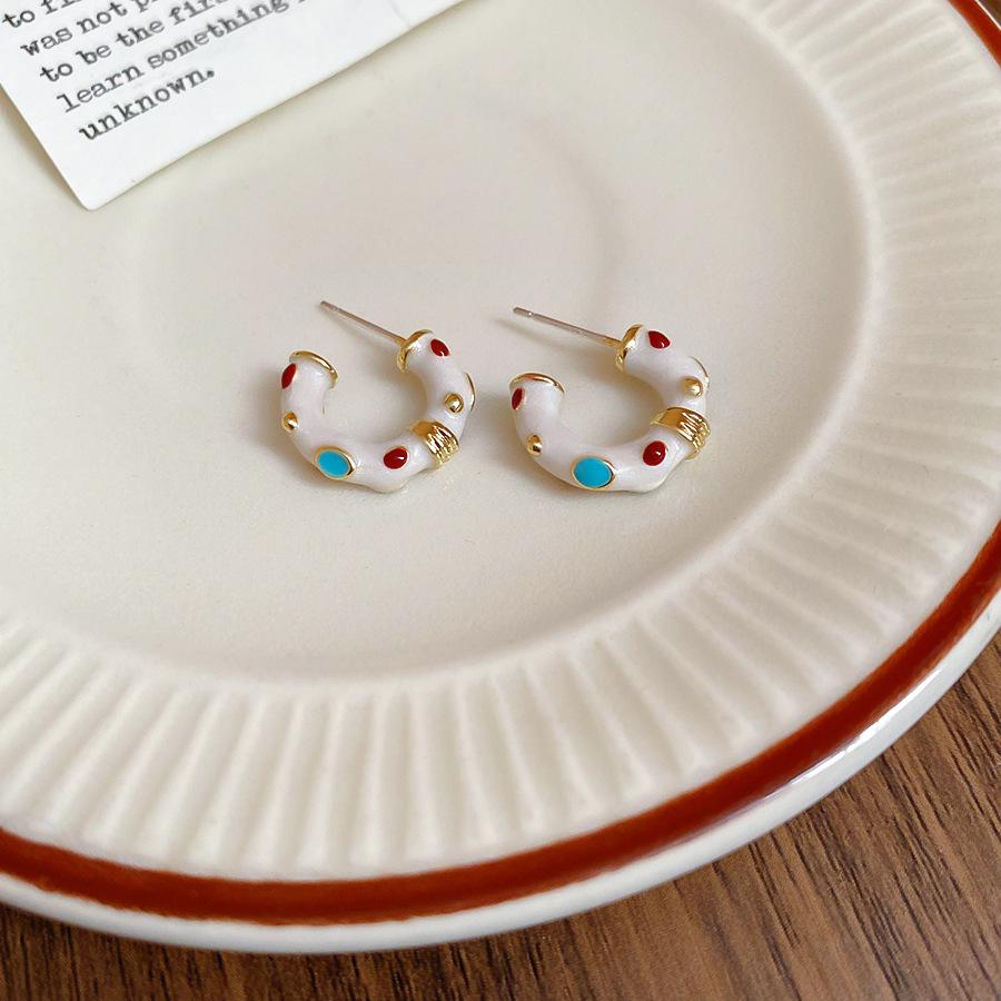Dripping oil irregular C-shaped earrings women s new stud earrings temperament earrings design sense niche