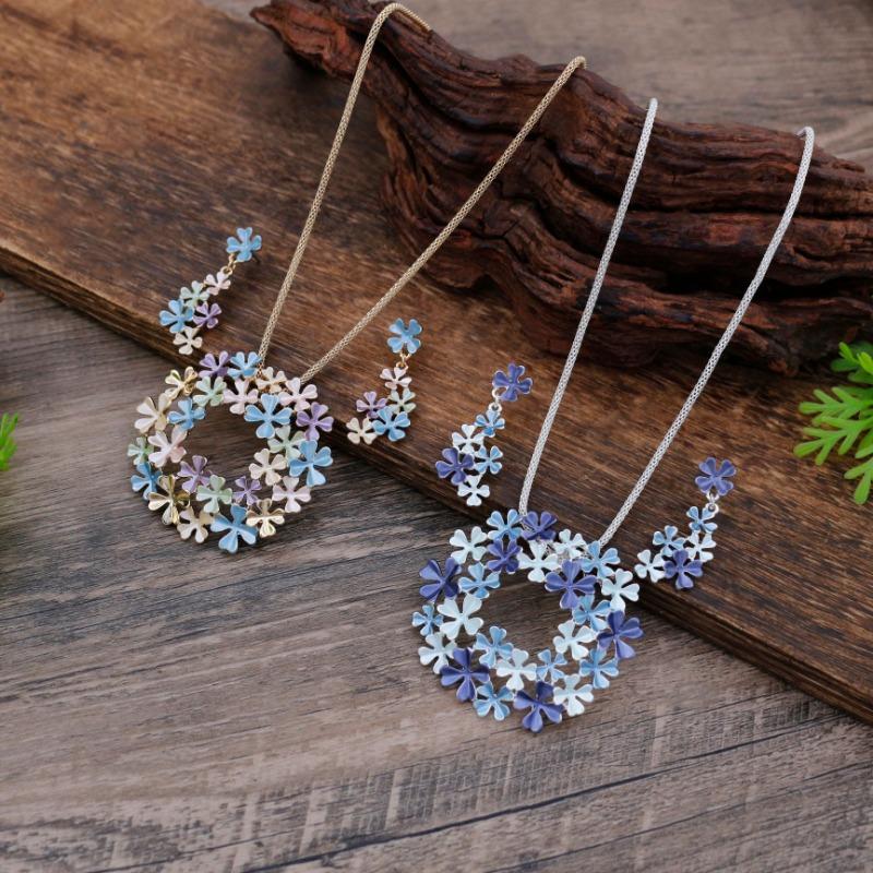 New enamel color hollow flower stud earrings pendant bracelet set women's autumn and winter high-end flower necklace