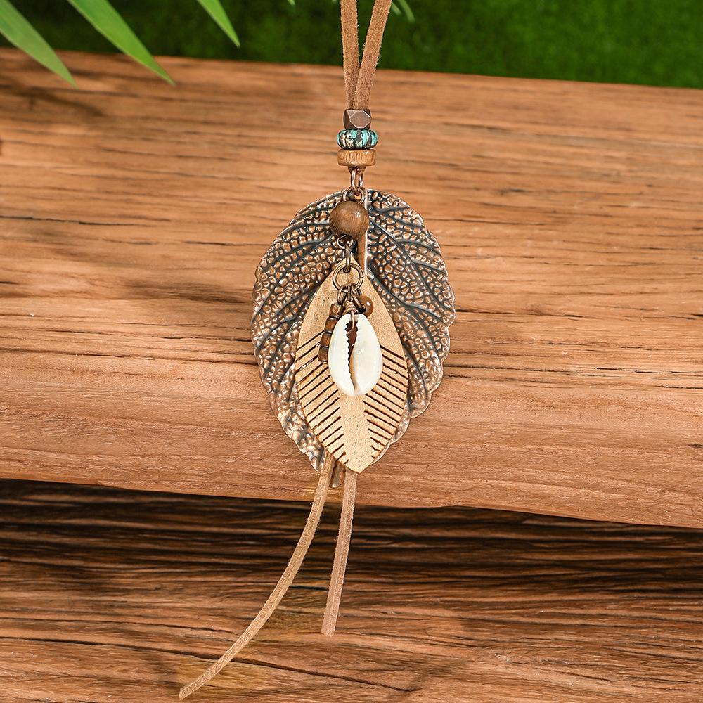 

Женская мода Бохо Длинное ожерелье Элегантное этническое ожерелье Ретро Коричневые подвески Ожерелья Ювелирные изделия 4