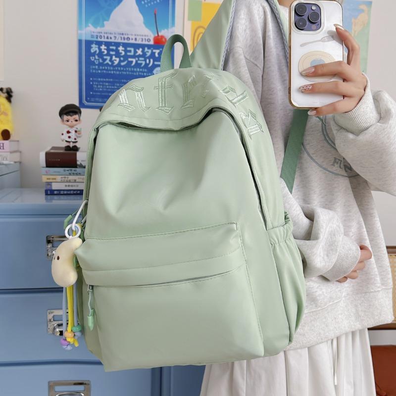 High-value letter embroidered schoolbag women's new large-capacity lightweight backpack student simple versatile backpack