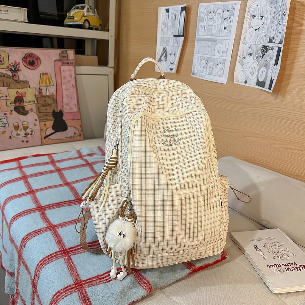 Plaid backpack for womeninsLarge-capacity student backpack in college style, lightweight, casual, and versatile for high school