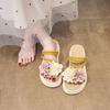Two-color flower platform slippers female 2025 summer new Korean version fairy wind flat bottom student fashion beach cool slippers