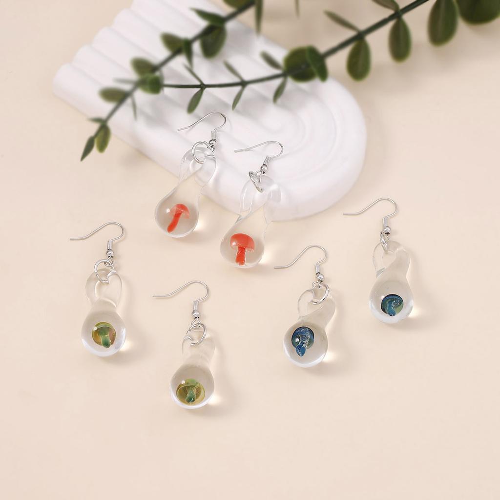 Niche creative irregular geometric transparent mushroom earrings twisted fun hollow personality female ear hook wholesale