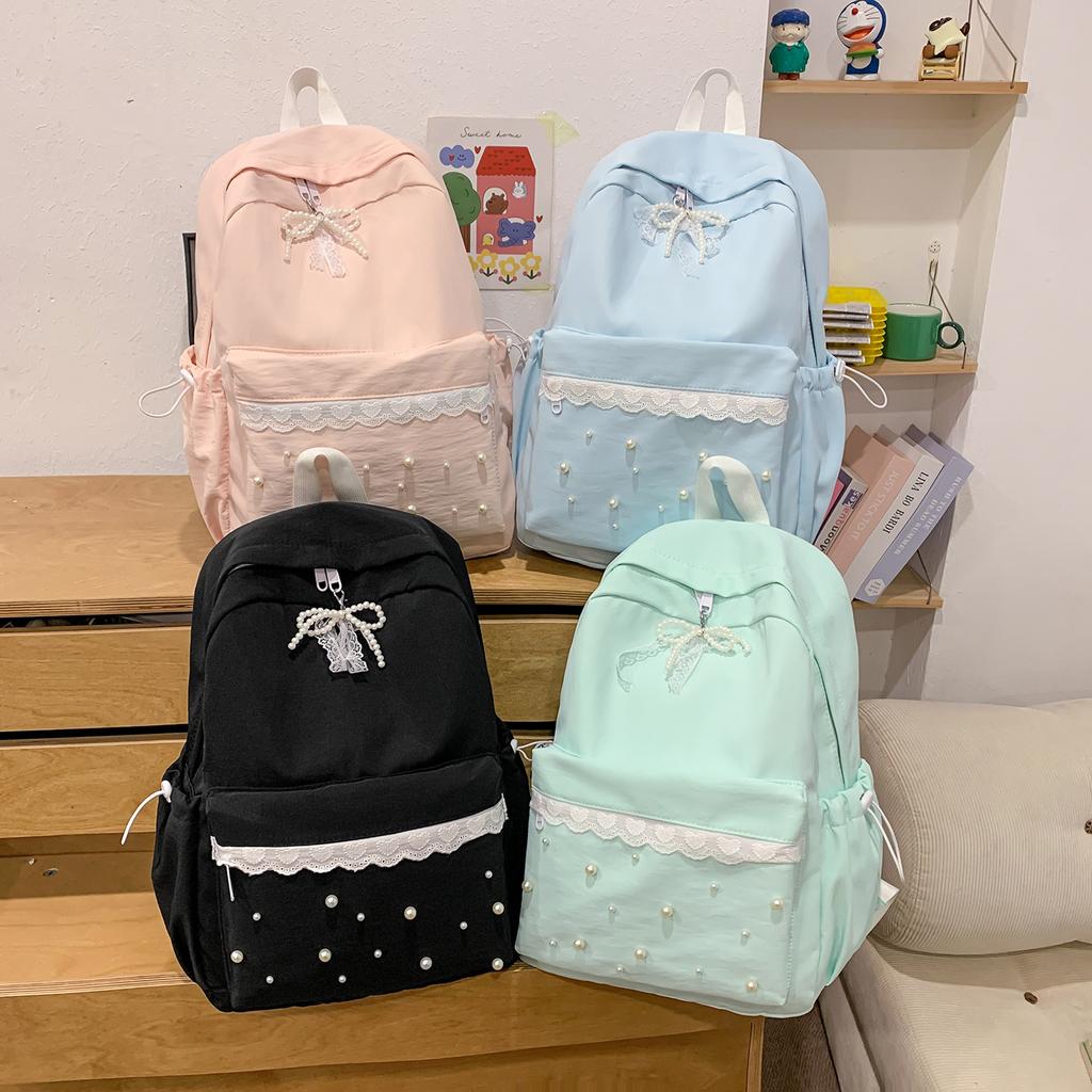 Zaino versione coreana dolce pizzo borsa zaino femminile carino fiocco perla zaino scolastico studente moda casual versatile zaino