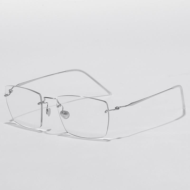 Rimless Titanium Alloy Unisex Glasses: Retro Light Luxury Frame for a High-End Feel