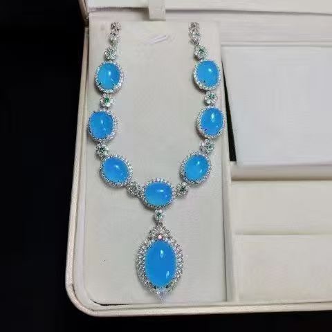 Light Luxury Sapphire Blue Oval Bead Four-piece Necklace Earrings Ring Bracelet Flash Diamond Dress Temperament Jewelry Set
