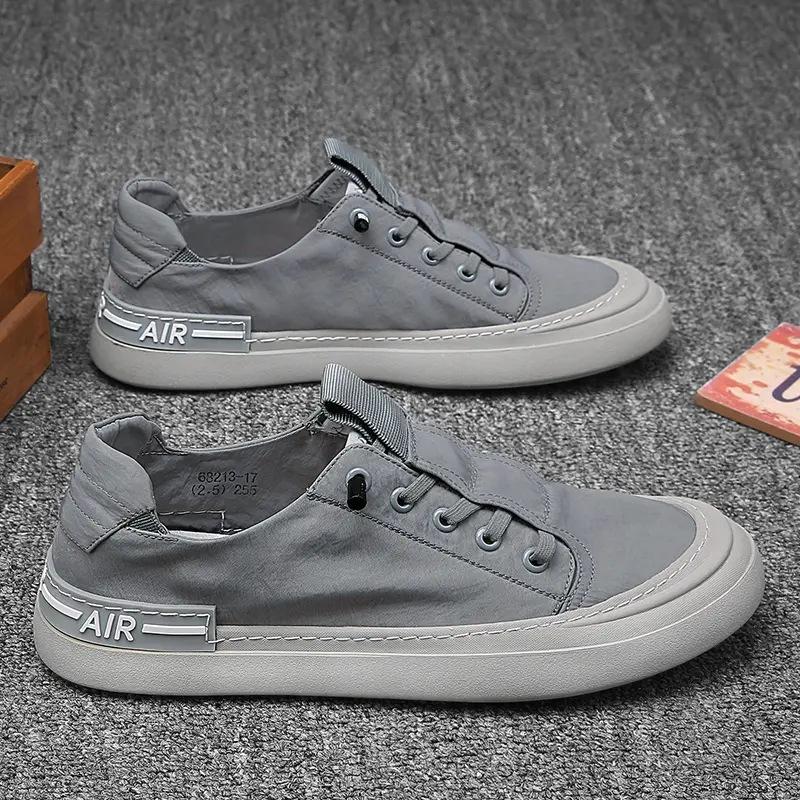 

Canvas men s shoes are breathable and deodorant in summer. Old Beijing cloth shoes are one-pedal construction site work. Non-slip soft-soled labor 44 сірий колір