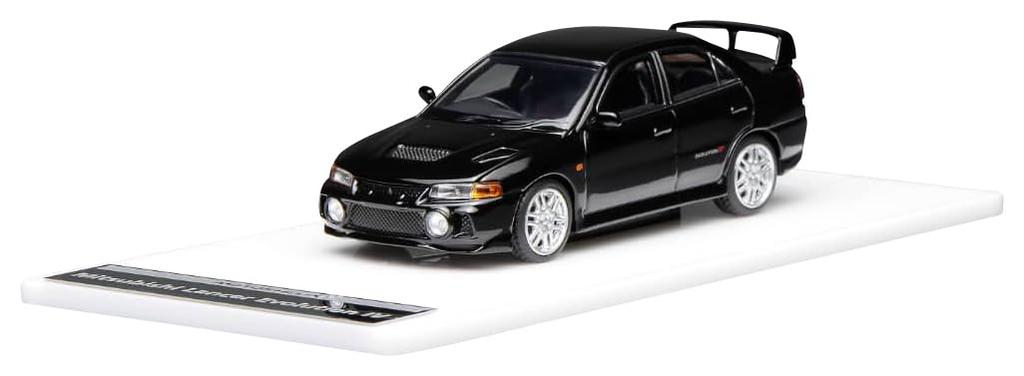FREESTYLE MOTORHELIX Mitsubishi Lancer Evolution IV Pyrenees Black Pearl Finished Model M64004 1/64