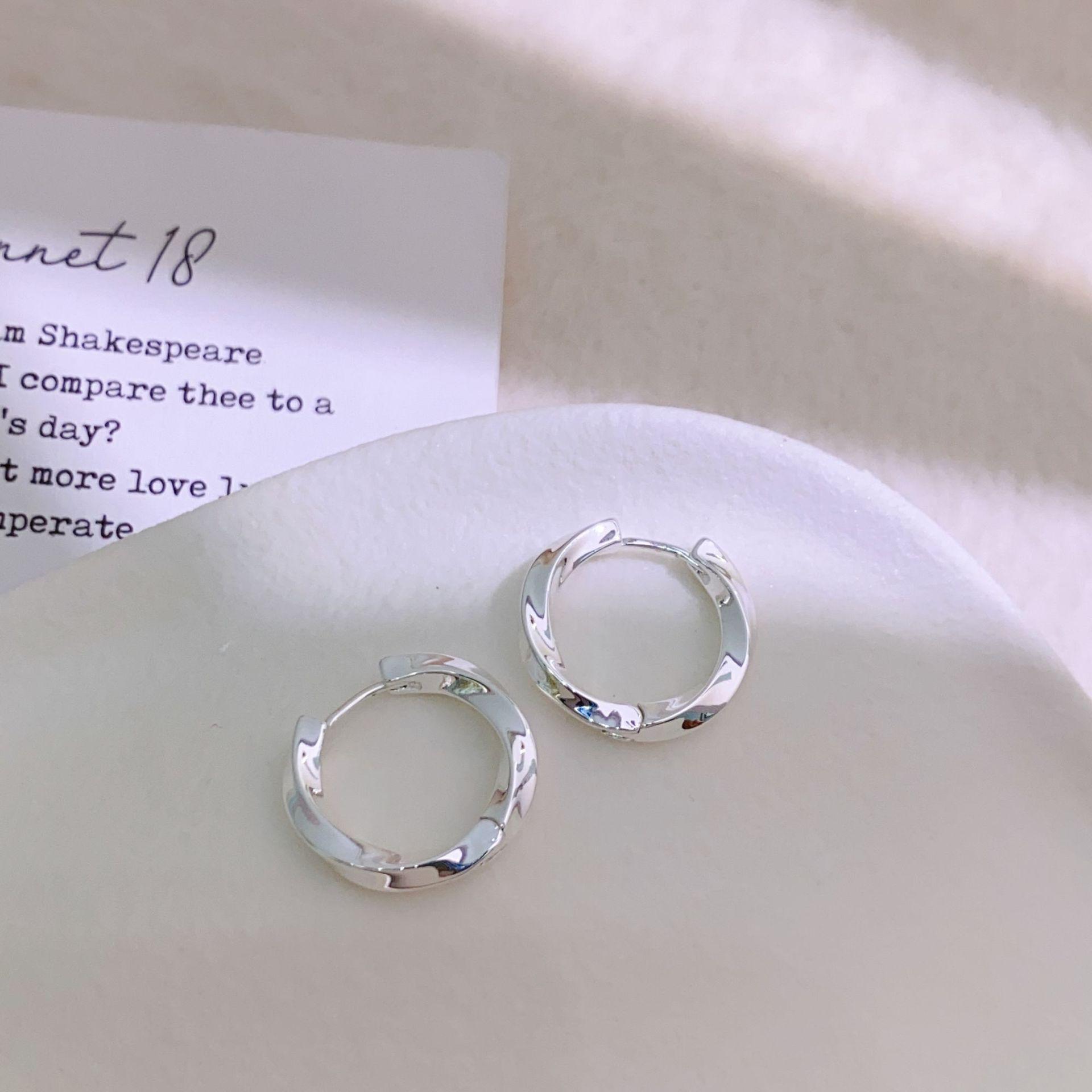 Mobius Silver Tone Geometric Hoop Earrings with High-End Fashion Design