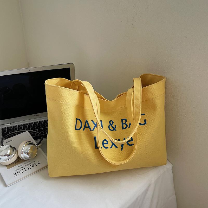 

Summer large canvas bag, cute milk yellow letter embroidered tote bag, women s new large-capacity tote bag жёлтый