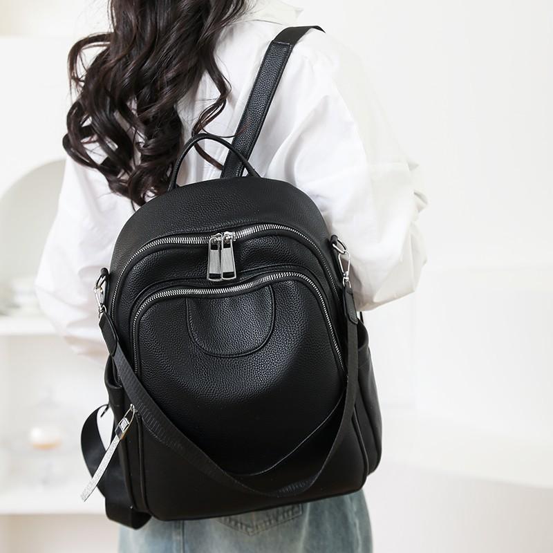 Sac à dos simple couleur unie pour femme grande capacité urbain polyvalent sac de travail texture PU fonctionnel sac à bandoulière décontracté