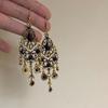 Exotic high-end fringed earrings, niche retro ethnic style earrings, French heavy industry bohemian earrings.