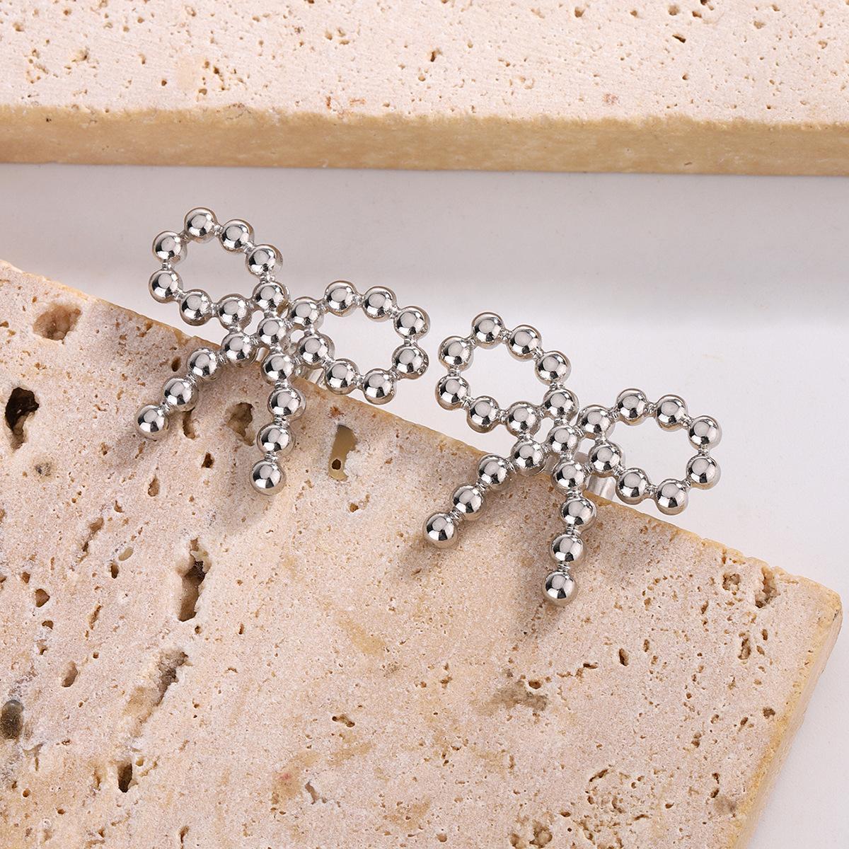 Korean simple bow earrings stainless steel niche design geometric earrings light luxury high-end earrings