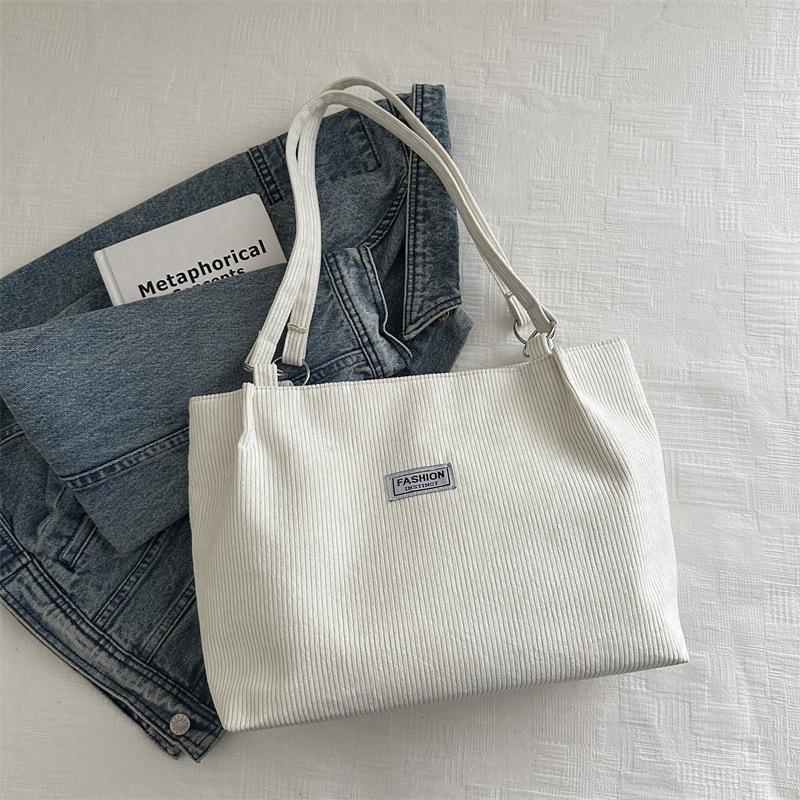 Corduroy bag women's large capacity 2025 new autumn and winter versatile casual shoulder shopping bag commuter tote bag