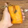 Men's Retro Genuine Leather Waist Key Holder: Large Capacity Cowhide Bucket Bag with Multifunctional Zipper Pouch.