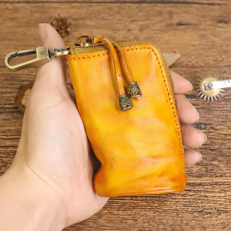 Men's Retro Genuine Leather Waist Key Holder: Large Capacity Cowhide Bucket Bag with Multifunctional Zipper Pouch.