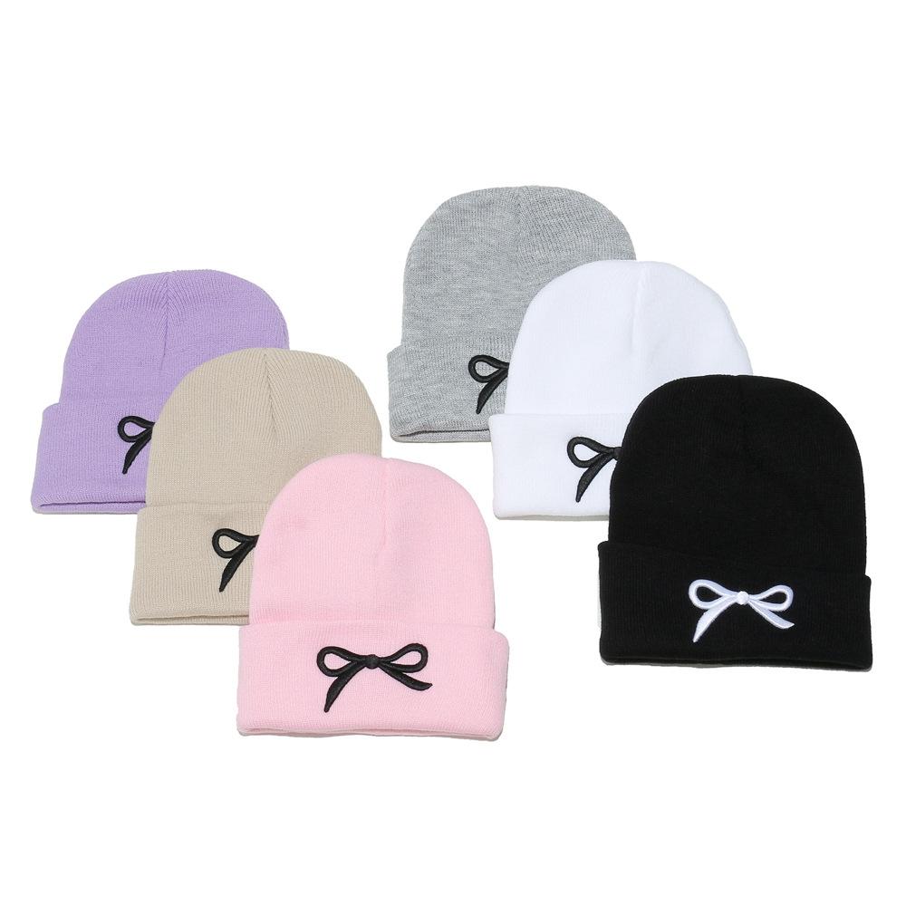2025 autumn and winter new knitted hat children's trend versatile cold hat Korean version outdoor bow wool hat