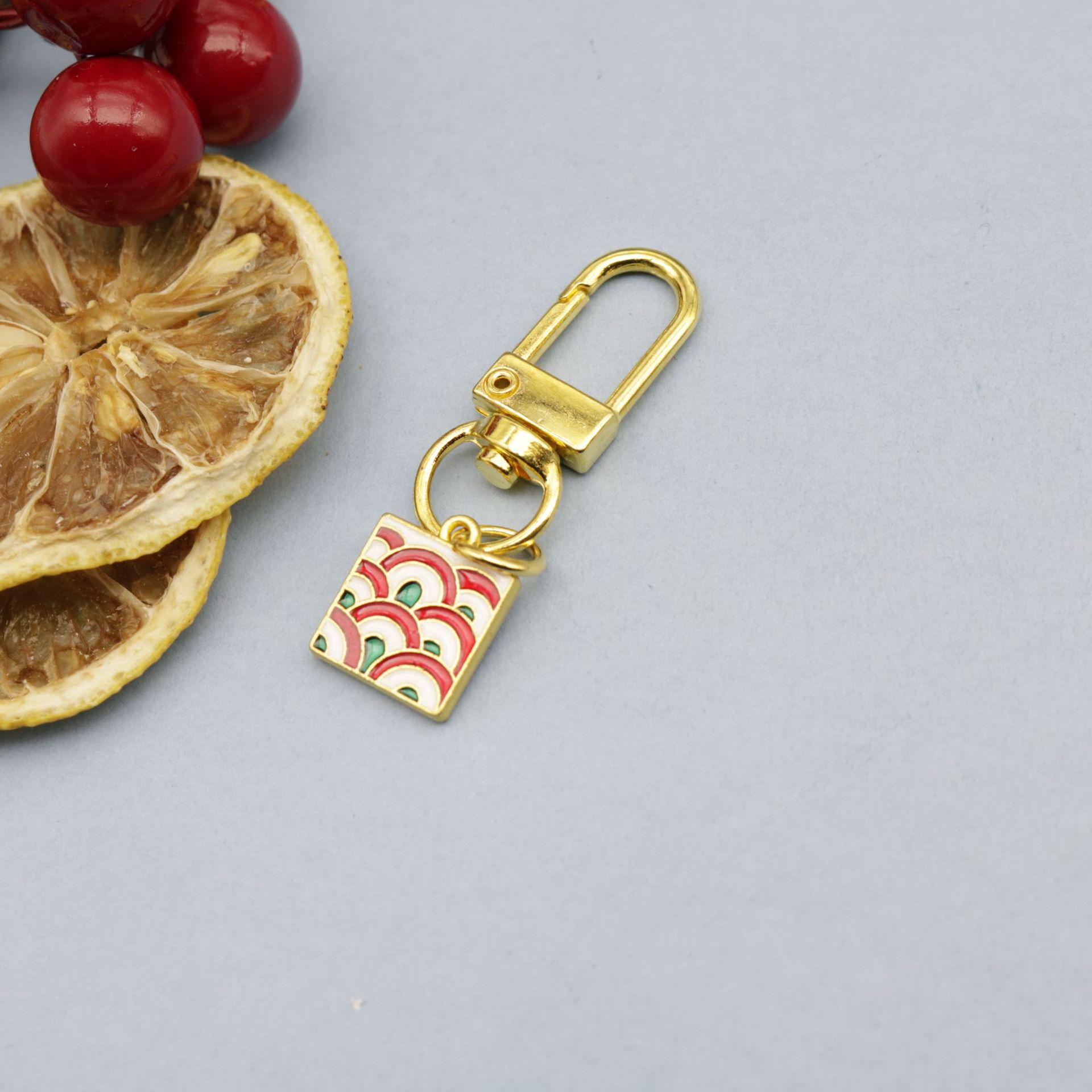Gold-Plated Woven Pendant Keychain & Bag Accessory by Wushi Pai
