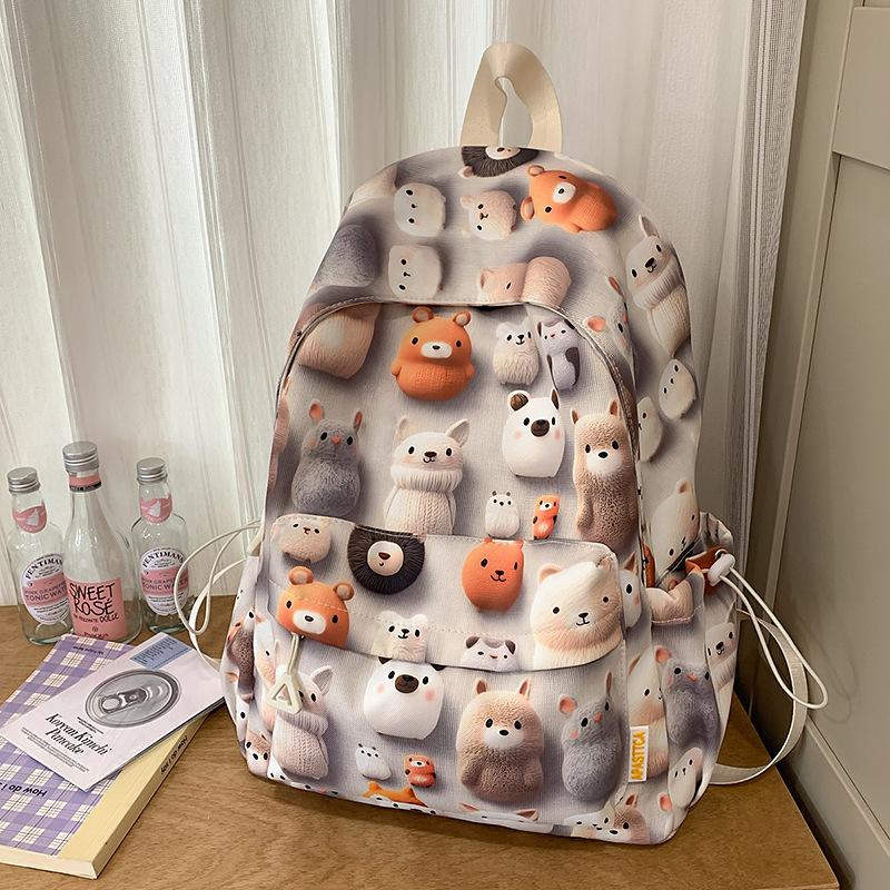 High value, fresh, sweet and cute printed backpack, lightweight make-up class for junior high school students, and large-capacity backpack.