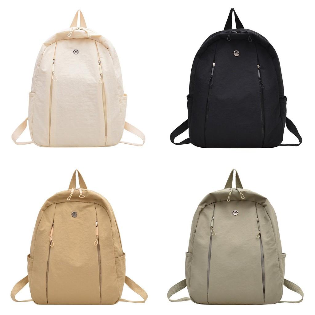 Lightweight Nylon Backpack For Commuting And Travel Withsmall Golden Roundel Decoration