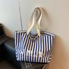 Niche design fashionable striped tote bag women's new large-capacity lazy wind shoulder bag canvas bag