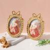 Handcrafted Antique Gold Carving Oval Bowknot Picture Frame With Hanging Hook And Stand For Wall Or Desktop Decoration