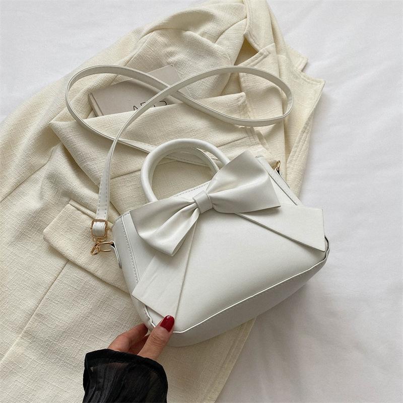 

Нишевая дизайнерская сумка женская 2025 новая модная ретро на плечо маленькая квадратная сумка с дизайном банта портативная сумка-мессенджер