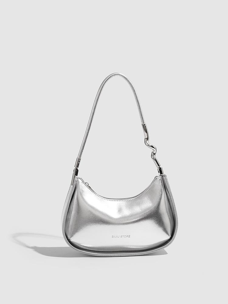

Niche design silver underarm bag women s 2025 new trend high sense fashion versatile shoulder baguette bag серебряный