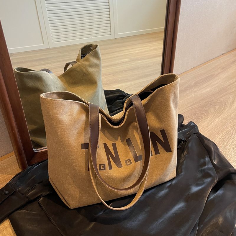 

Casual Large Capacity Canvas Bag Female 2025 New Arrival Tide Fashion Shoulder Bag Class Handbag Commuter Tote Khaki