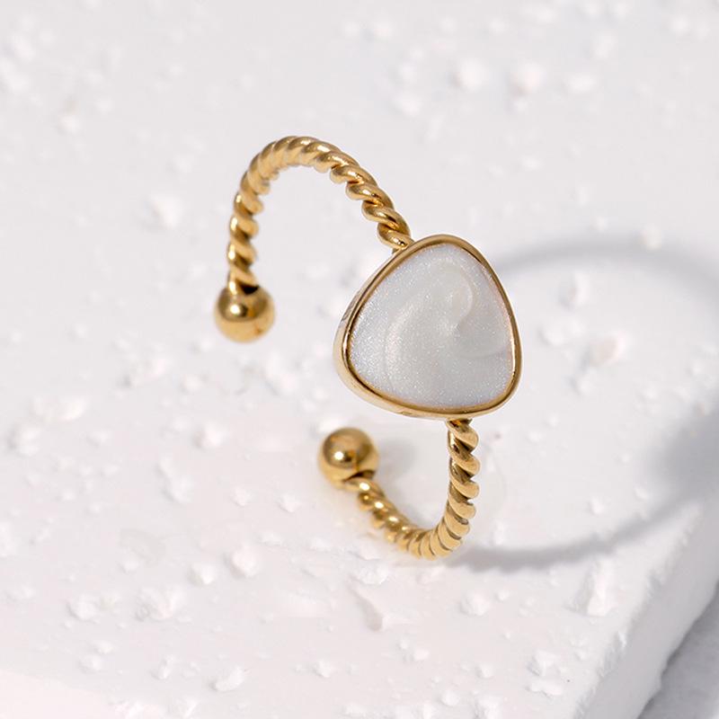 Women's Adjustable Heart-Shaped Twist Ring - Non-Fading Stainless Steel with Niche Design